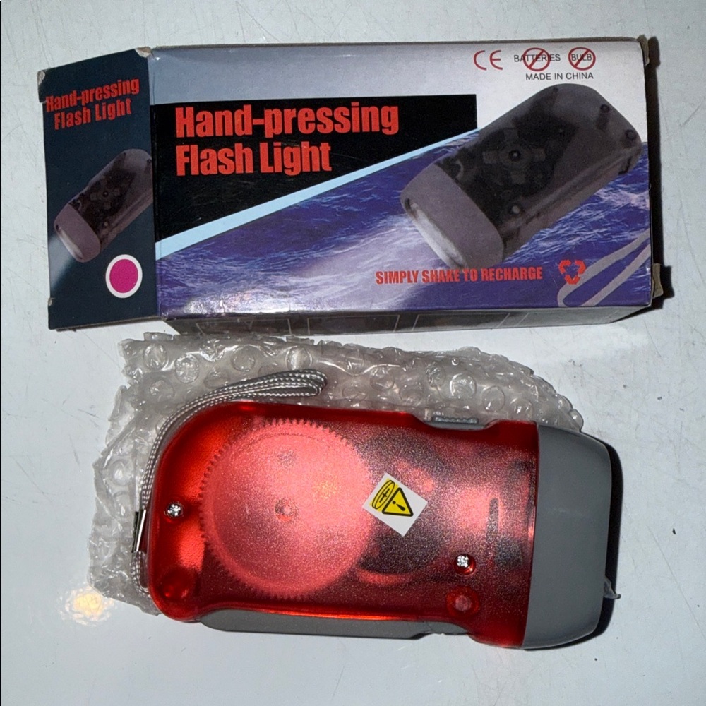 Hand-Pressing Flashlight - Pink (reddish) and Gray
